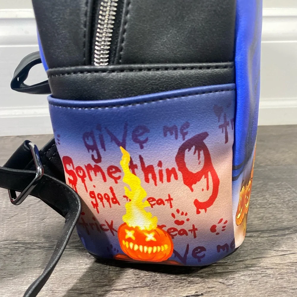 NEW | LOUNGEFLY Trick 'R Treat Glow-In-The-Dark Sam Mini Backpack